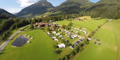 Reisemobilstellplatz - Umgebungsschwerpunkt: Fluss - Österreich - Camping Lindlerhof 
Ihr zu Hause in den Bergen - Camping am See Gut Lindlerhof, mit Ferienhäuser und Almhütten