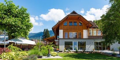 Reisemobilstellplatz - Swimmingpool - Österreich - Sanitärhaus und Zugang zum Restaurant - Naturcamping Juritz