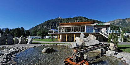 Reisemobilstellplatz - Wohnwagen erlaubt - Österreich - Stellplatz vor und im Alpen Caravan Park Achensee