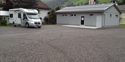 Motorhome parking space - Restaurant - Switzerland - Beschreibungstext für das Bild - Toggenburg, Alt St. Johann, Ochsenwis