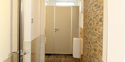 Reisemobilstellplatz - Entsorgung Toilettenkassette - Sanitärbereich - Weinland-Camping