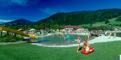 Motorhome parking space - Umgebungsschwerpunkt: Fluss - Austria - Wasserrutsche, mit Kinderbecken - Stellplatz See-Camping Eben