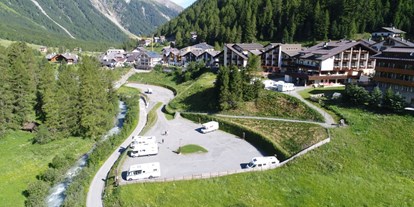 Motorhome parking space - Art des Stellplatz: bei Bergbahn - Italy - Alpina Mountain Resort