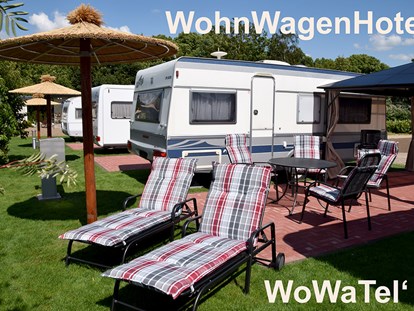 Reisemobilstellplatz - SUP Möglichkeit - Kevelaer - Auf dem WomoPark befindet sich auch ein WohnWagenHotel - das WoWaTel'. Dies ist das erste WohnWagenHotel Deutschlands! Genießen Sie eine hochwertige Ausstattung und ein urlaubsmäßiges Arrangement! - Wohnmobilpark Xanten