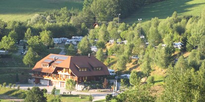 Reisemobilstellplatz - Grauwasserentsorgung - Schwarzwald - Hauptgebäude mit Wohnmobilstellplätze - Trendcamping