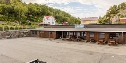 Reisemobilstellplatz - Umgebungsschwerpunkt: am Land - Norwegen - Wohnmobilplatz - Erevik Grendatun