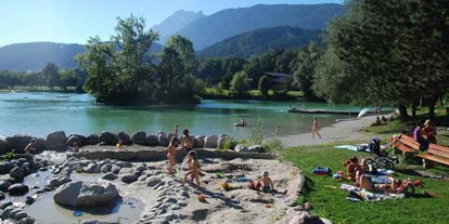 Reisemobilstellplatz - öffentliche Verkehrsmittel - Tirol - Badesee Weisslahn Wasserspielpaltz 2km entfernt - Stellplatz Plankenhof 