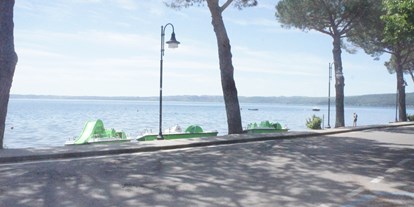 Motorhome parking space - Umgebungsschwerpunkt: Stadt - Italy - BLUE LAKE CAMPER