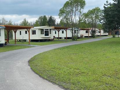 Motorhome parking space - Angelmöglichkeit - Mobilheime sind sehr schön - Camp Casel - Das Feriendorf für Camping und Wohnen am Gräbendorfer See