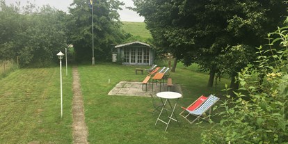 Reisemobilstellplatz - Spielplatz - Weener - Der Garten vom Restaurant. Campinggäste dürfen ihn gerne benutzen. - Fährhaus Hotel & Restaurant am Deich
