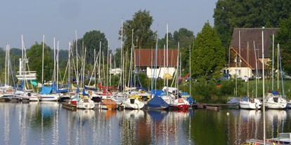 Reisemobilstellplatz - Art des Stellplatz: bei Gaststätte - Nordrhein-Westfalen - Boote am Lippesee - Stellplatz am Lippesee