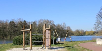 Reisemobilstellplatz - Umgebungsschwerpunkt: Fluss - Menslage - Spielgeräte in unmittelbarer Umgebung - Parkplatz Erholungsgebiet am See