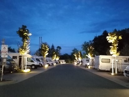 Motorhome parking space - Therme - Germany - Blick - Richtung Therme mit Abendbeleuchtung - Wohnmobilstellplatz an der Therme Bad Steben