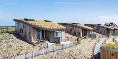 Motorhome parking space - Wohnwagen erlaubt - Denmark - Neue Hütten auf dem Campingplatz - Vorupør Camping