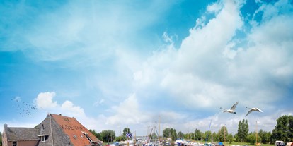Reisemobilstellplatz - Oudega (Súdwest Fryslân) - Camping, Yachthafen und Ferienwohnungen - Recreatiebedrijf De Koevoet
