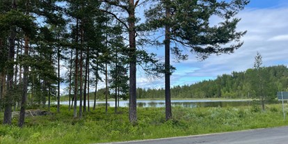 Motorhome parking space - Frischwasserversorgung - Dalarna - Aussicht Nahe des Stellplatzes - Fågelsjö Gammelgård Bortom Åa
