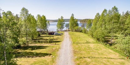 Motorhome parking space - Sauna - Sweden - Tyngsjö Vildmark AB