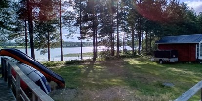 Reisemobilstellplatz - Nordschweden - Blick aus Ferienhaus - Blattnicksele Camping