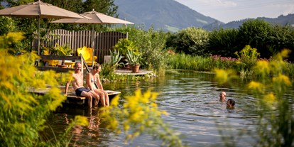 Reisemobilstellplatz - Umgebungsschwerpunkt: am Land - Steiermark - Wunderschöner Bioschwimmteich - 50Plus Campingpark Fisching