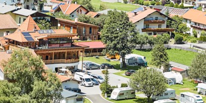Reisemobilstellplatz - Duschen - Längenfeld - Camping Dreiländereck Tirol, Blockhütten & Apartments