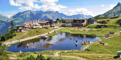 Reisemobilstellplatz - Vorarlberg - Das Bärenland am Sonnenkopf. Das Familienhighlight im Klostertal mit über 30 Spielstationen. - Walch's Camping & Landhaus