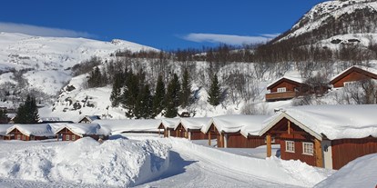 Reisemobilstellplatz - Umgebungsschwerpunkt: Berg - Norwegen - Østerbø Fjellstove im Winter. Der Campingplatz ist im Winter geschlossen, es ist jedoch möglich, Hütten und Miethütten zu mieten - Østerbø Fjellstove