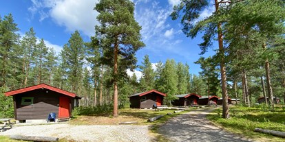 Reisemobilstellplatz - Bademöglichkeit für Hunde - Norwegen - Hütten C - Koppang Camping og Hytteutleie