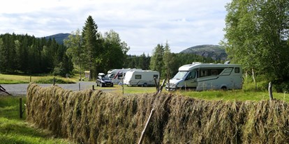 Motorhome parking space - Badestrand - Northern Norway - Campingplatz mit 8 Plätze - Velfjord Camping & Hytter