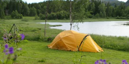 Motorhome parking space - Badestrand - Northern Norway - Separater Zeltplätze - Velfjord Camping & Hytter