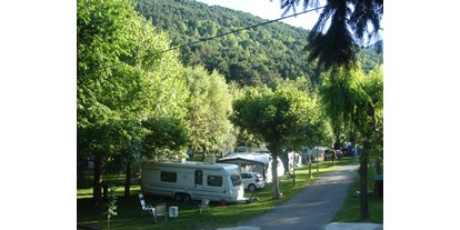 Motorhome parking space - Tennis - Spain - Camping la Mola