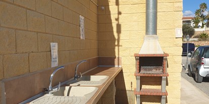 Reisemobilstellplatz - Entsorgung Toilettenkassette - Comunidad Valenciana - Grill für den allgemeinen Gebrauch, - Orange Grove Camper Park