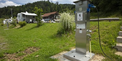 Motorhome parking space - Duschen - Schwarzwald - Entsorgungsstation mit Wasser, Abwasser,
Strom und Fäkalienentsorgung am Platz - Wohnmobilstellplatz an der Wehra / Todtmoos