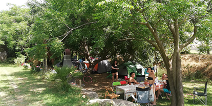 Motorhome parking space - Grauwasserentsorgung - Italy - Camping Flintstones Park