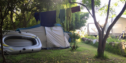 Motorhome parking space - Bademöglichkeit für Hunde - Italy - Camping Flintstones Park