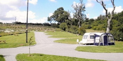 Reisemobilstellplatz - Preis - Großbritannien - Greetham Retreat - Caravan and Motorhome Club (CAMC) touring caravan site