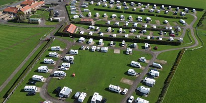 Motorhome parking space - Entsorgung Toilettenkassette - Aerial view of the distance to the town and Abbey, less than a mile to walk.  - Broadings Farm Caravans and Holiday Cottages