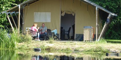 Reisemobilstellplatz - Frischwasserversorgung - Arel - Camping Aux Sources de Lescheret