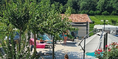 Motorhome parking space - Duschen - Slovenia - Lazy summer afternoon on the pool. - Kamp Brda, Camping & Rooms