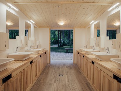 Reisemobilstellplatz - Restaurant - Part of our toilete areas - Forest Camping Mozirje
