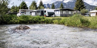 Reisemobilstellplatz - Zugspitze - Camping Biberhof direkt an einem idyllischen Bach inmitten herrlicher Natur gelegen - Stellplatz am Camping Biberhof