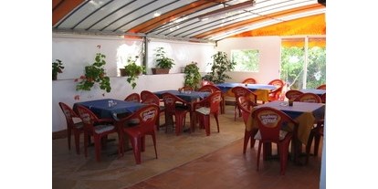 Motorhome parking space - Umgebungsschwerpunkt: am Land - Costa del Azahar - terasse - Restaurant Spätzle Fritz mit Womostelplatz