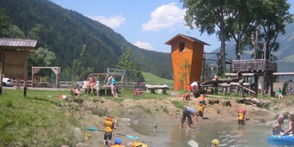 Reisemobilstellplatz - Umgebungsschwerpunkt: Fluss - Österreich - Strand zum Spielen  - Sport-Erlebnis-Camp