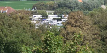 Reisemobilstellplatz - Art des Stellplatz: eigenständiger Stellplatz - Zeeland - Blick von den Dünen  - Camping Weltevreden