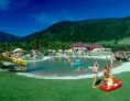 Wohnmobilstellplatz: Wasserrutsche, mit Kinderbecken - Stellplatz See-Camping Eben