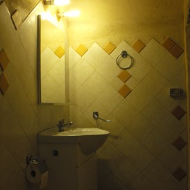 Wohnmobilstellplatz: Toilette / Badezimmer - Agricamping - Agriturismo Petra di Cossu
