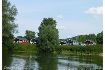 Wohnmobilstellplatz: Ferienhäuser am See - Erholungsgebiet Doktorsee