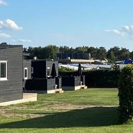 Wohnmobilstellplatz: our luxury cottages for up to 6 persons - DCU-Camping Rågeleje Strand