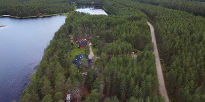 Reisemobilstellplatz - WLAN: nur um die Rezeption vorhanden - Finnland - Eräkeskus Wilderness Lodge