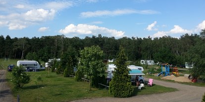Reisemobilstellplatz - Swimmingpool - Polen - geräumige Stellplätze. - Camping de Kleine Stad