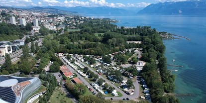 Motorhome parking space - Duschen - Haut-Savoie - Emplacement au Camping Vidy